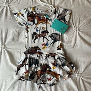 Posh peanut “Claire” twirl -never worn with tags. Size 12-18 months.